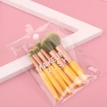 5-piece makeup brush set with yellow handles and rose gold ferrules in a clear bag - Yellow