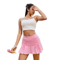 Conjunto de minifalda rosa con volantes y top blanco de canalé con cordón ajustable - S / Rosa