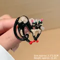 Cute black enamel cat brooch with crystals, size 3.3x3.3cm, weights 11.2g on hand - Green-Eyed Black Cat