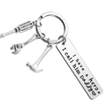 Stainless steel keychain with tool charms and engraved 'I have a hero I call him Daddy' text - Silver