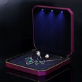 Rose red LED jewelry box with gold trim featuring emerald and pearl necklace set - Large Set Box / Purple