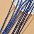 Macro detail of 3/4mm blue turquoise loose round beads on a white ceramic plate - 1# 3mm Blue (Approx 145pcs)
