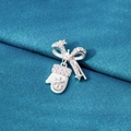 Christmas bow and snowflake glove charm with rhinestones on teal silk background - Christmas Gloves Style