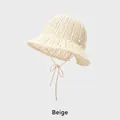 Beige hollow crochet sun hat for women featuring wavy brim and long lace-up straps - Adjustable (54-58cm) / Beige
