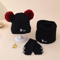 Detail of winter knit set with beanie, scarf, and gloves featuring plush red pompoms - Black