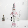 Detail of telescopic legs on a plush Christmas gnome with pink and green plaid fabric - Pink Santa Claus