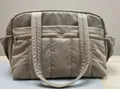 Beige quilted nylon travel bag with multi-pocket design and large capacity storage - Brown
