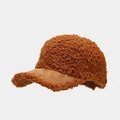 Detail view of caramel brown lamb wool baseball cap with faux suede brim texture - Adjustable / Caramel color