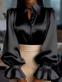Detail view of black satin blouse with lantern sleeves and ruffled cuffs texture - S / Top (808) / Black