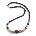 Bohemian style chakra beaded necklace featuring polished black stones and colorful gems - Obsidian Necklace
