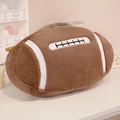 Soft plush American football pillow toy in brown with white stitched details - Rugby Ball Pillow
