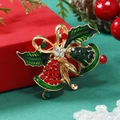Detailed close-up of Christmas bell brooch with red and green rhinestones on gold base - Green Double Bells (BR1575)