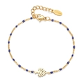 Detail of 18k gold plated tree of life charm and blue enamel beads on steel bracelet - Blue