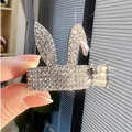 Close-up of silver rabbit ear hair claw clip with rhinestones and crown detail - Rabbit Silver Rhinestone