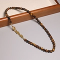 2mm natural tiger eye bead necklace with a delicate gold clasp on a wooden tray - XL0095 Tiger Eye Stone with Gold Buckle