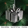 Close-up of clear acrylic gift box ornaments hanging on Christmas tree branches - 83mm Gift Box Pendant