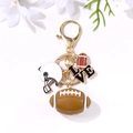 American football keychain with gold ring, white helmet, LOVE charms, and soft rubber ball - Gold American Football Helmet Heart Style