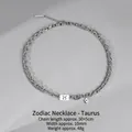 Double-layered stainless steel Taurus zodiac necklace with blue gem in silver tone - Taurus