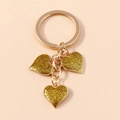 Minimalist gold heart keychain with three sparkling glitter filled heart pendants - Large Heart / Yellow