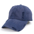 Detail of distressed navy blue cotton baseball cap featuring vintage ripped hole accents - Adjustable / Navy Blue