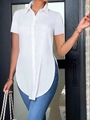 Detail of white short sleeve polo shirt featuring a unique curved irregular hemline - S / White
