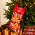 Plaid Christmas stocking with gingerbread man embroidery hanging on a festive Xmas tree - Gingerbread Man - Gift Stocking