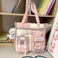 Pink and purple patchwork school backpack with cute plush charms and cartoon badges - Single Shoulder Bag with Charms and Badges / Pink