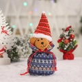Blue knitted Christmas candy bag with teddy bear head and festive red drawstring - Knitted Bear