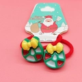 Pair of festive Christmas tree elastic hair ties on a Santa themed display card - Christmas Bow