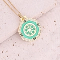 Detail of gold octagon pendant with green enamel and crystal inlay on stone surface - Green Enamel Sun Octagon Style (6#)