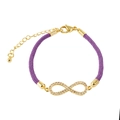 Detailed macro of a purple braided rope bracelet with a gold infinity symbol and lobster clasp - Infinity / Purple