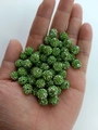 Macro detail of grass green clay disco ball beads with crystals held in hand for scale - 10mm / Light Green AB