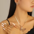 Elegant gold butterfly jewelry set featuring hollow filigree necklace, earrings and rings - Hollow Mesh Butterfly Style (8183)
