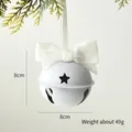White 8cm Christmas metal bell ornament with star cutouts and a glittery white bow - 8x8 Style / White