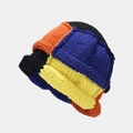 Close-up of thick ribbed knit texture on the multi-color patchwork winter beanie hat - One Size / Black