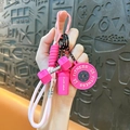 Pink silicone fitness keychain variant featuring dumbbell and shaker bottle charms, cute style. - Pink