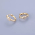 Close-up of golden star hoop earrings with micro-paved cubic zirconia and snap closure - Star Hoop - Gold