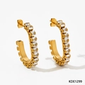 Gold-plated C-shaped hoop earrings featuring a row of clear rectangular cubic zirconia - Gold / White Zirconia