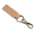 Detail van de handgemaakte bruine lederen sleutelhanger met vintage bronzen sluiting - Groot / Geelachtig Bruin
