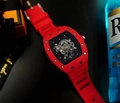 Skeleton mechanical watch featuring a red silicone strap and red RM 35-02 model case - Red Skeleton Style