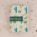 White PU card holder featuring green cactus patterns and secure metal snap closure - White Cactus