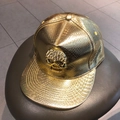 Goldene Snapback-Cap aus PU-Leder mit Schlangenmuster, Totenkopf und Straßsteinen - Gold - Gold Totenkopf