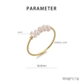 Detailed view of a 4mm thin golden stainless steel ring with 5 natural freshwater pearls - US 6 / Gold (KR111005-KLX)