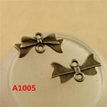 Antique bronze bow-shaped metal alloy charm with double loops for DIY jewelry making - A1005-21*10MM