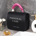 Grande borsa cosmetica nera con manico in seta rosa e dettaglio di perle eleganti - Nero