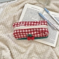 Detail of red cherry embroidery on a checkered knit pouch with soft plush texture - Cherry Decoration Makeup Box