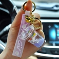 Unicorn milk tea keychain with purple liquid, sequins and soft silicone strap - Lilac Purple