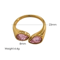 Bague ouverte élégante en titane doré avec deux cristaux roses en poire et dimensions - Or rose