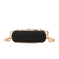 Elegante pochette cilindrica nera glitterata con telaio in metallo dorato e catena - Nero