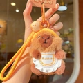 Adorable plush capybara keychain wearing a baking apron and mini toast accessory - Toast Hat Apron
